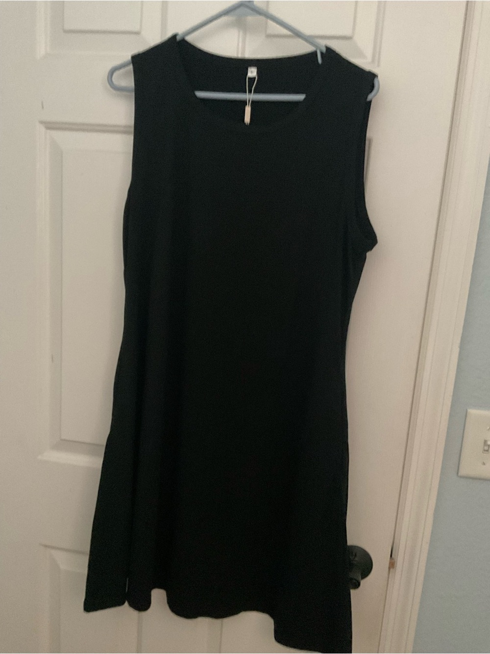 Classic Sleeveless  DRESSES one Black A-Line and one navy with white polkadots